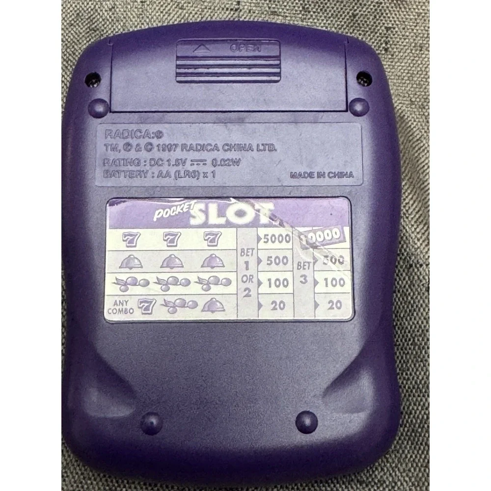 Vintage 1997 Radica Pocket Slot Handheld Electronic Casino Game Purple Tested
